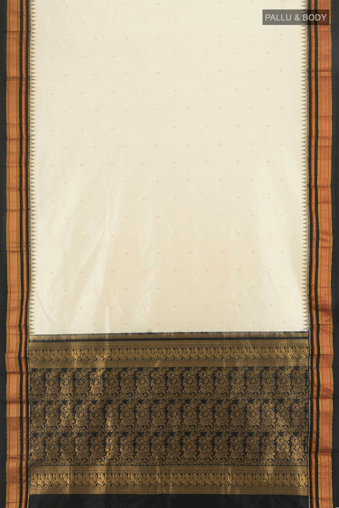 Flat view of Cream Narayanpet Silk Saree with Zari Butta on the body and Silk Border. 