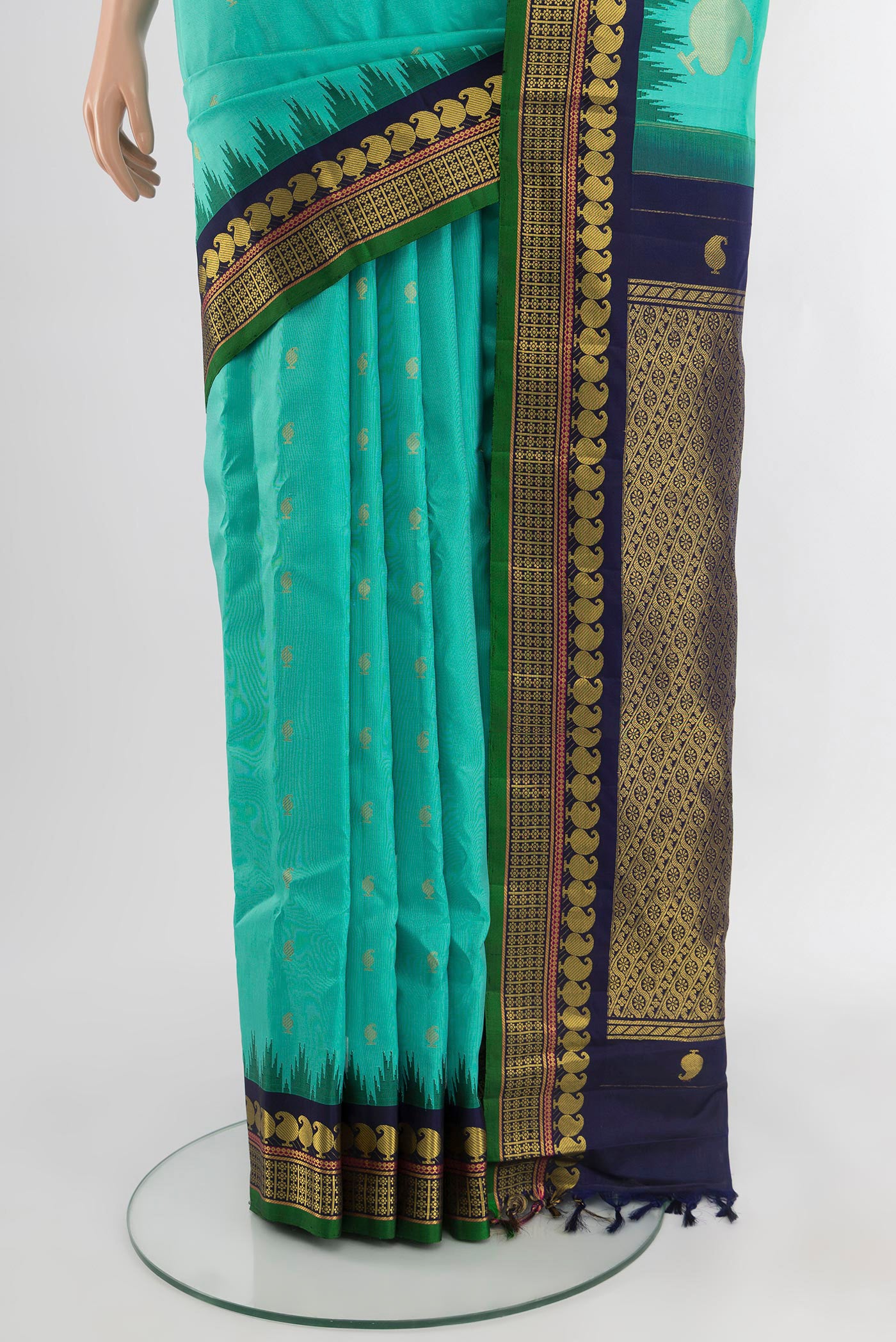 Pleats and pallu of Light Blue Gadwal Silk Saree with Zari Butta on the body and Zari Border. 