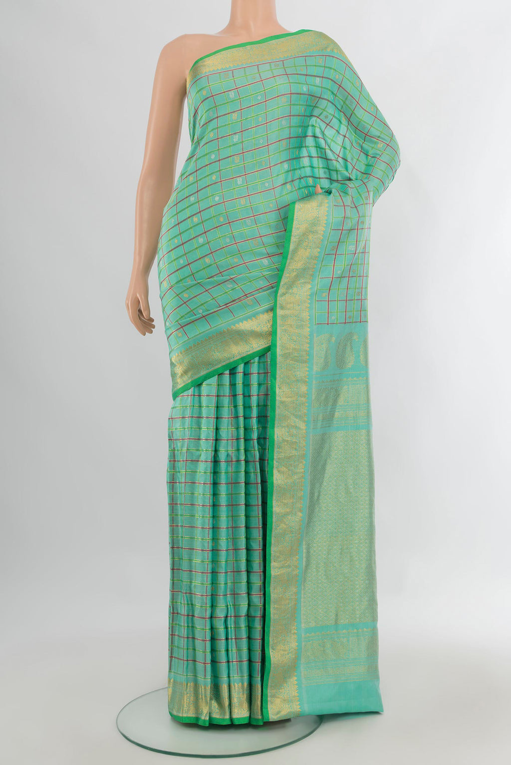 Pure Silk Sea Green Gadwal Saree with Checked design on the body and Zari Border.  displayed on a mannequin