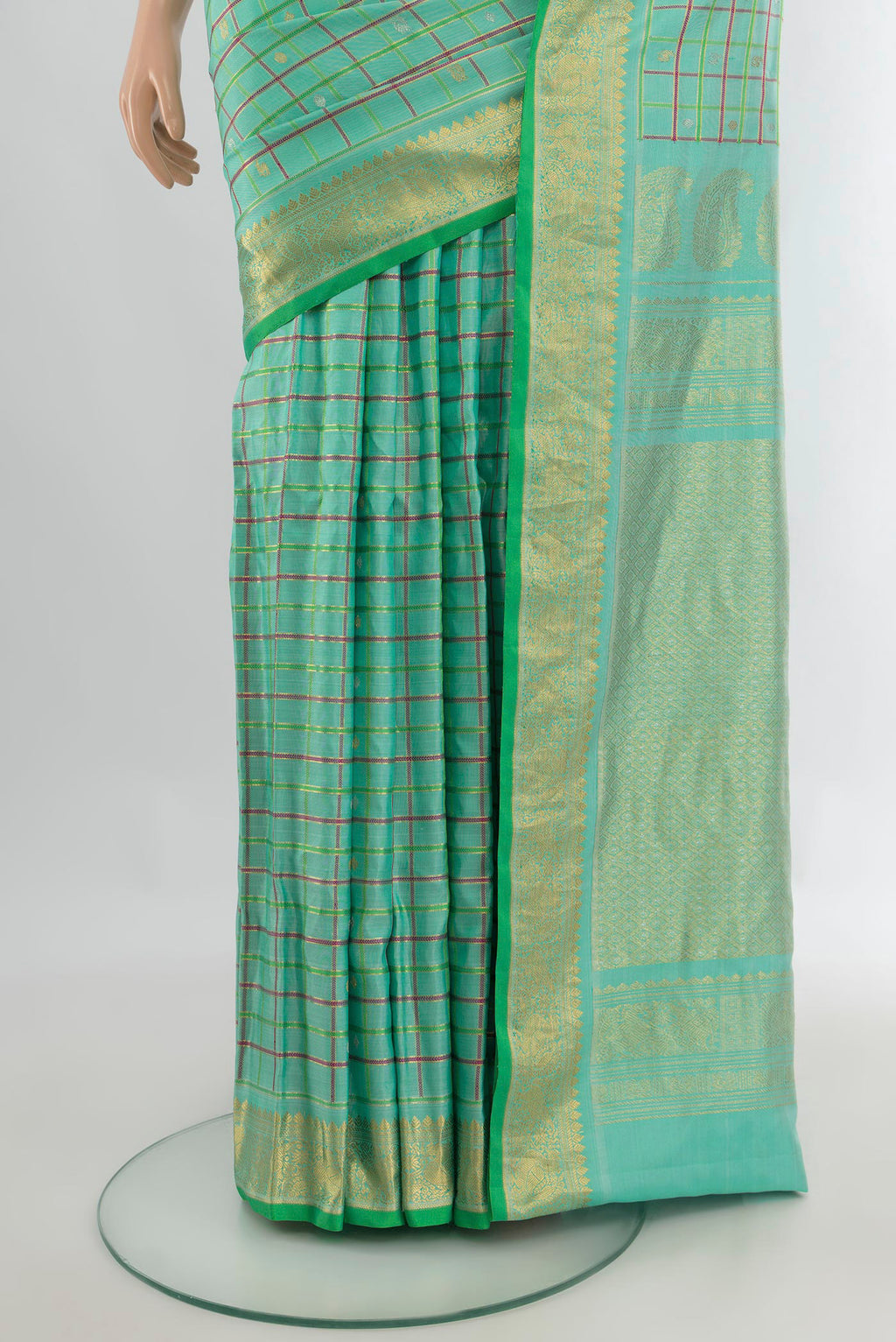 Pleats and pallu of Pure Silk Sea Green Gadwal Saree with Checked design on the body and Zari Border. 