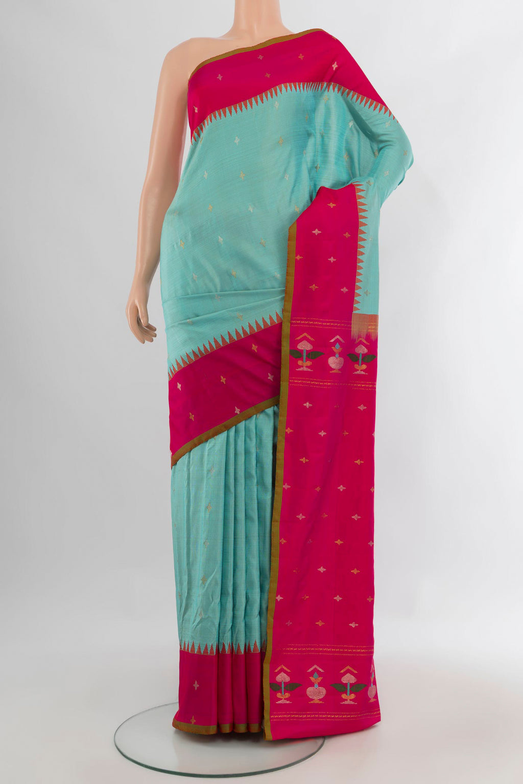 Pure Silk Light Blue Gadwal Saree with Zari Butta on the body and Zari Border.  displayed on a mannequin