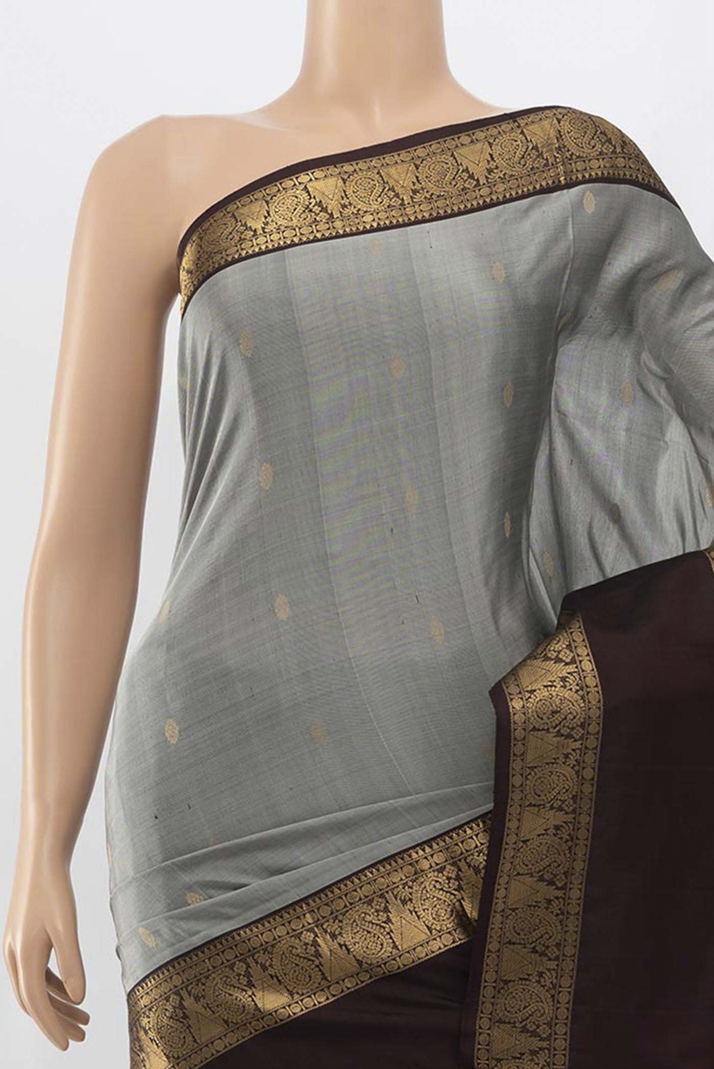 Border image of Grey Soft Silk Saree with Zari Butta on the body and Zari Border. 