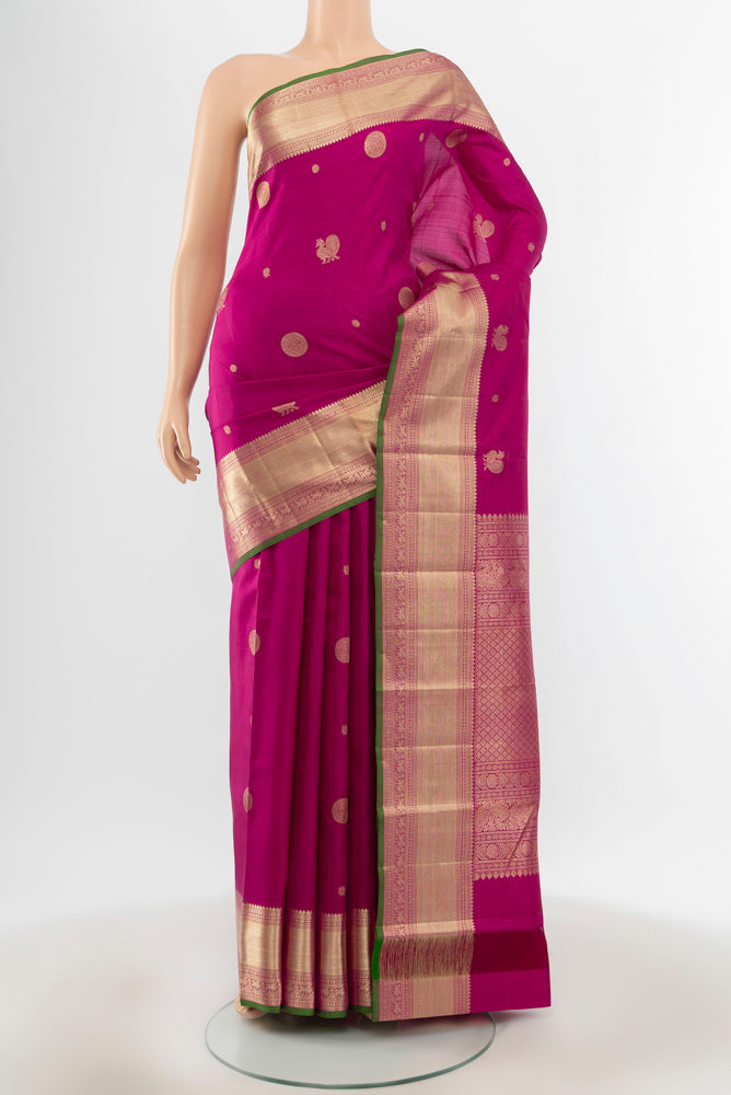 Purple Kanjivaram Silk Saree with Plain Body and Silk Border.  displayed on a mannequin