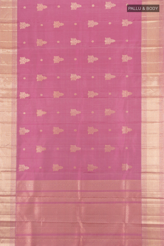 Flat view of Bronze Kanjivaram Silk Saree with Zari Butta on the body and Silk Border. 