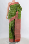 Light Green Kanjivaram Silk Saree with Zari Brocade on the body and Silk Border.  displayed on a mannequin