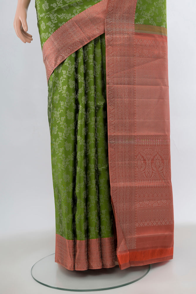 Pleats and pallu of Light Green Kanjivaram Silk Saree with Zari Brocade on the body and Silk Border. 