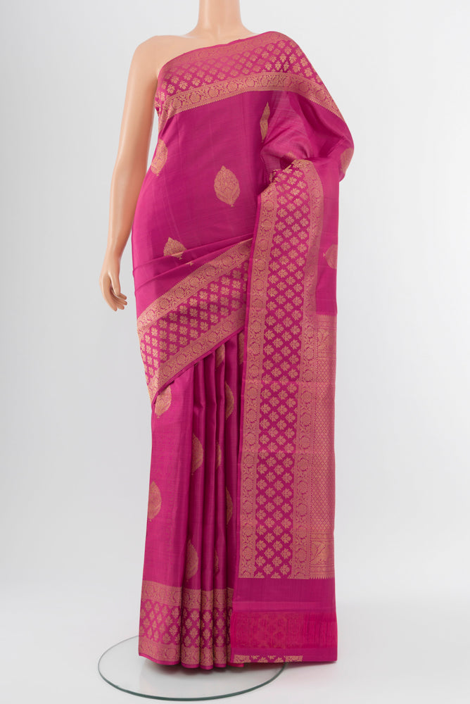 Imperial Pink Kanjivaram Silk Saree with Zari Butta on the body and Silk Border.  displayed on a mannequin