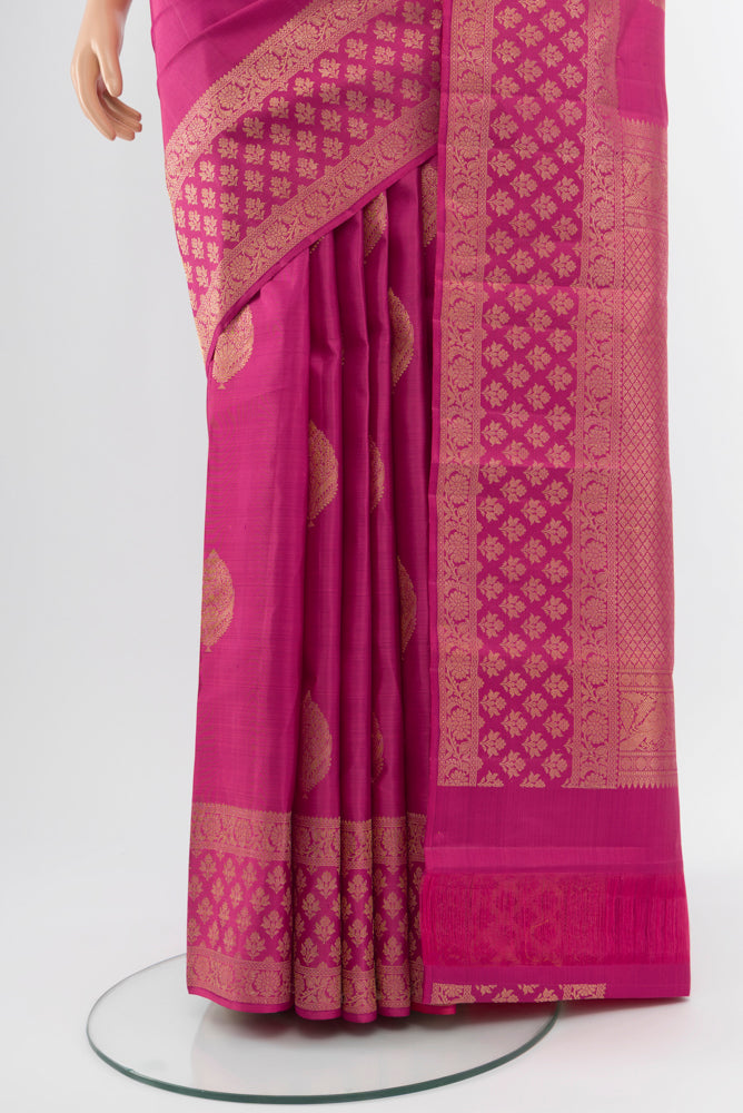 Pleats and pallu of Imperial Pink Kanjivaram Silk Saree with Zari Butta on the body and Silk Border. 