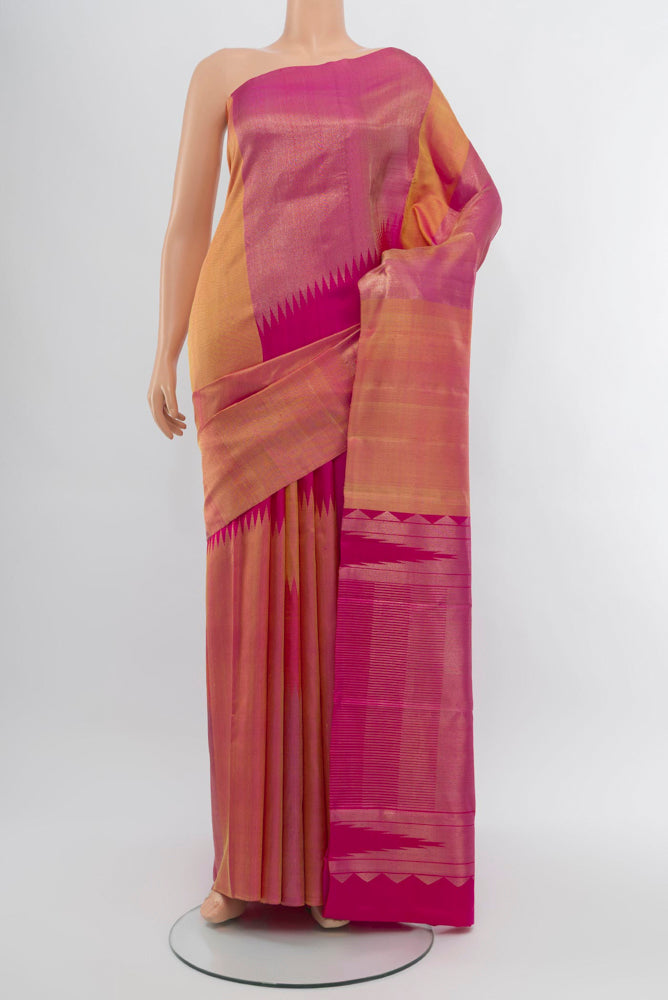 Multi Color Kanchipuram Silk Saree with Zari Butta on the body and Silk Border.  displayed on a mannequin