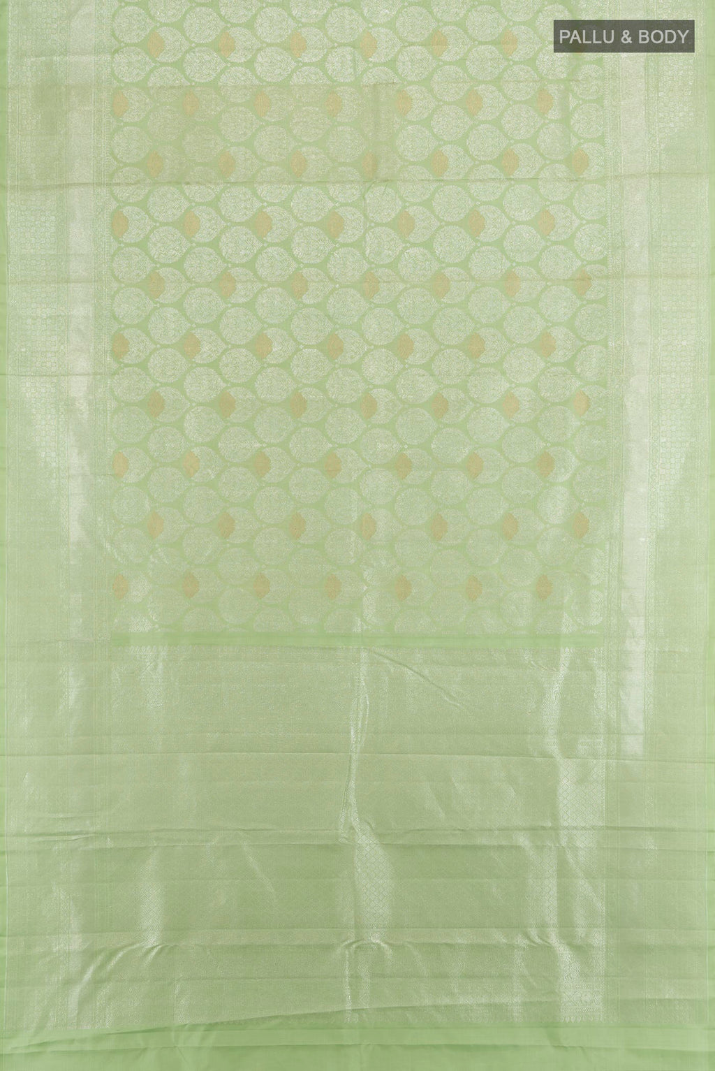 Flat view of Pista Green Kanchipuram Silk Saree with Zari Brocade on the body and Zari Border. 
