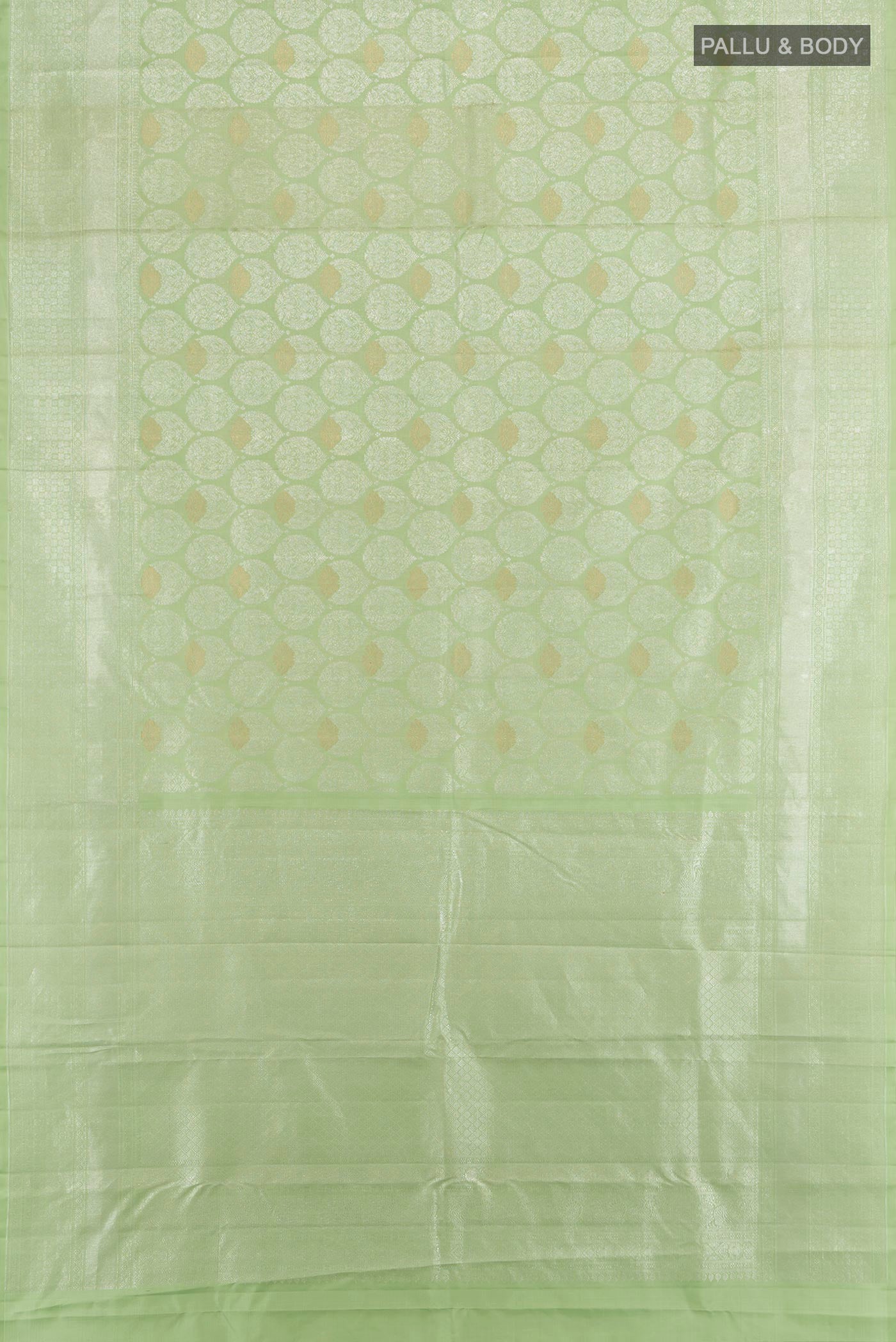 Flat view of Pista Green Kanchipuram Silk Saree with Zari Brocade on the body and Zari Border. 