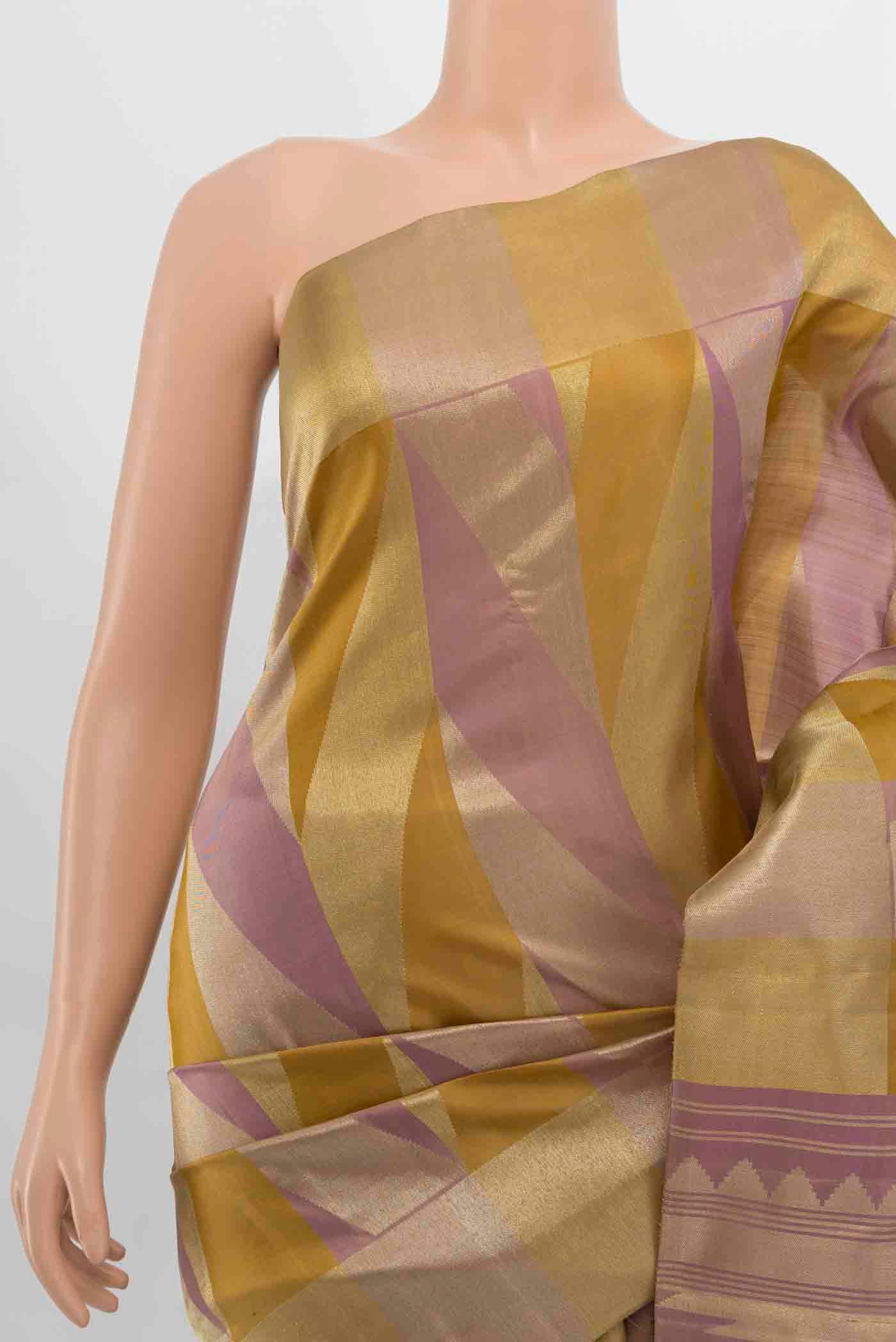 Border image of Golden Kanchipuram Silk Saree with Zari Butta on the body and Silk Border. 