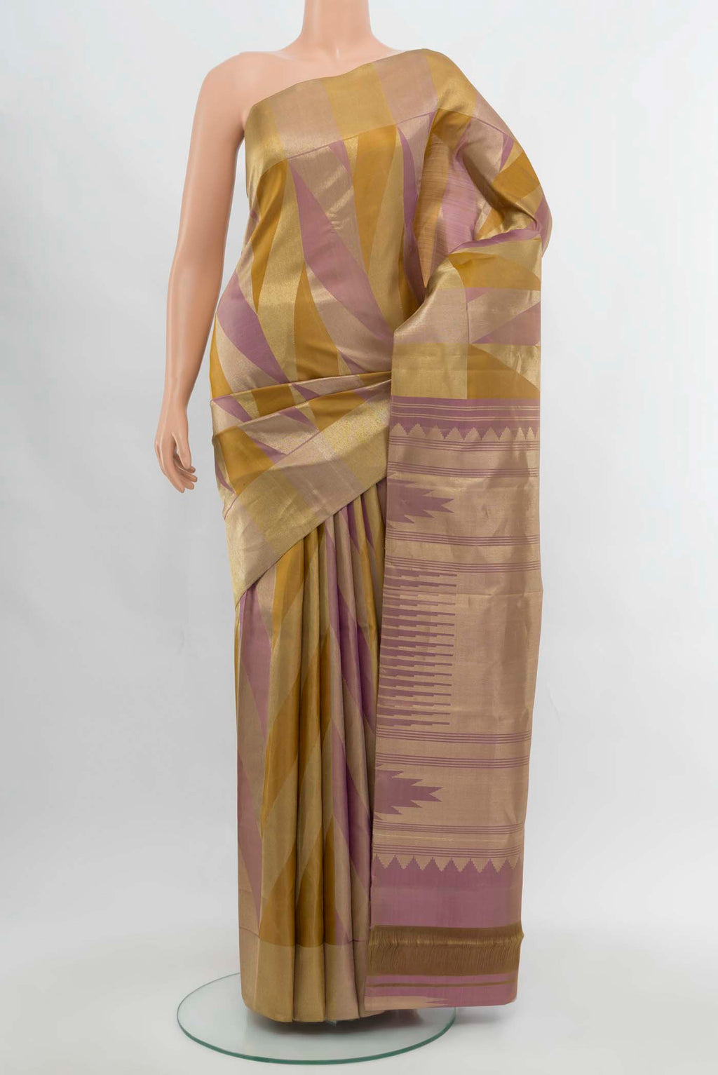 Golden Kanchipuram Silk Saree with Zari Butta on the body and Silk Border.  displayed on a mannequin