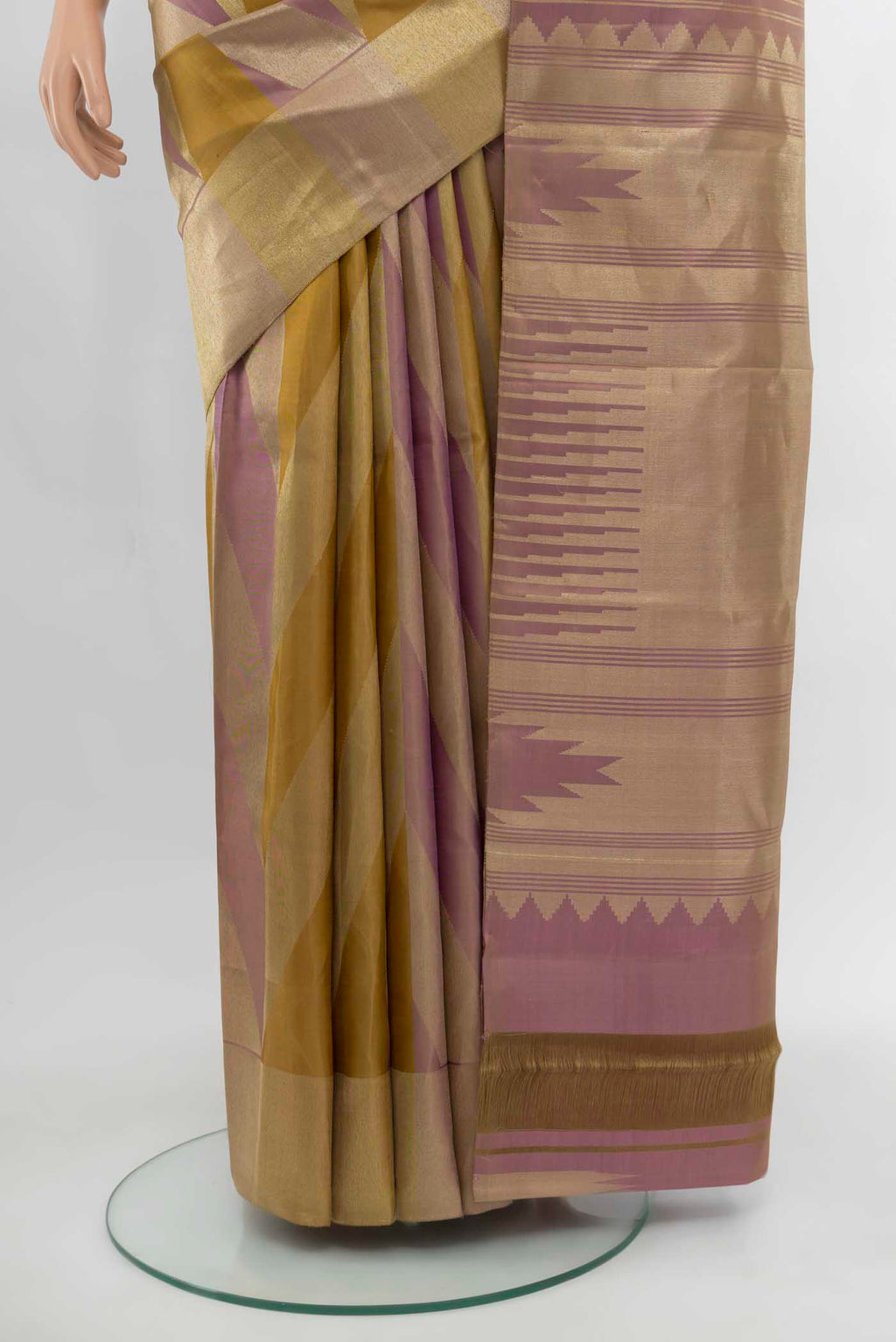 Pleats and pallu of Golden Kanchipuram Silk Saree with Zari Butta on the body and Silk Border. 