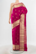 Pure Silk Pure Zari Magenta Kanjivaram Saree with Zari Butta on the body and Silk Border.  displayed on a mannequin