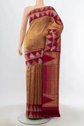 Golden Kanchipuram Silk Saree with Zari Butta on the body and Silk Border.  displayed on a mannequin