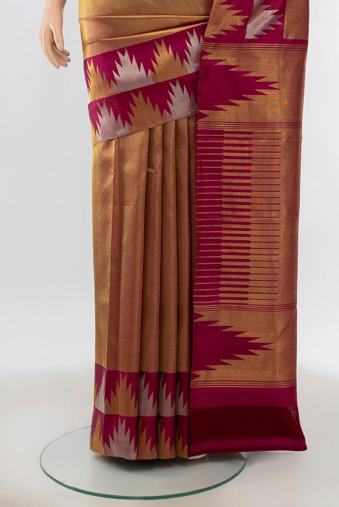 Pleats and pallu of Golden Kanchipuram Silk Saree with Zari Butta on the body and Silk Border. 