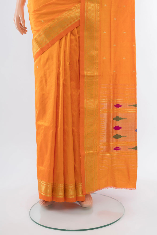 Pleats and pallu of Orange Paithani Silk Saree with Zari Butta on the body and Silk Border. 