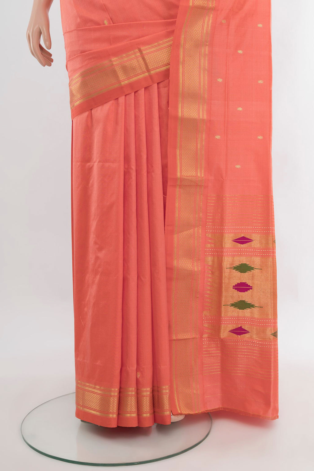 Pleats and pallu of Coral Paithani Silk Saree with Zari Butta on the body and Zari Border. 