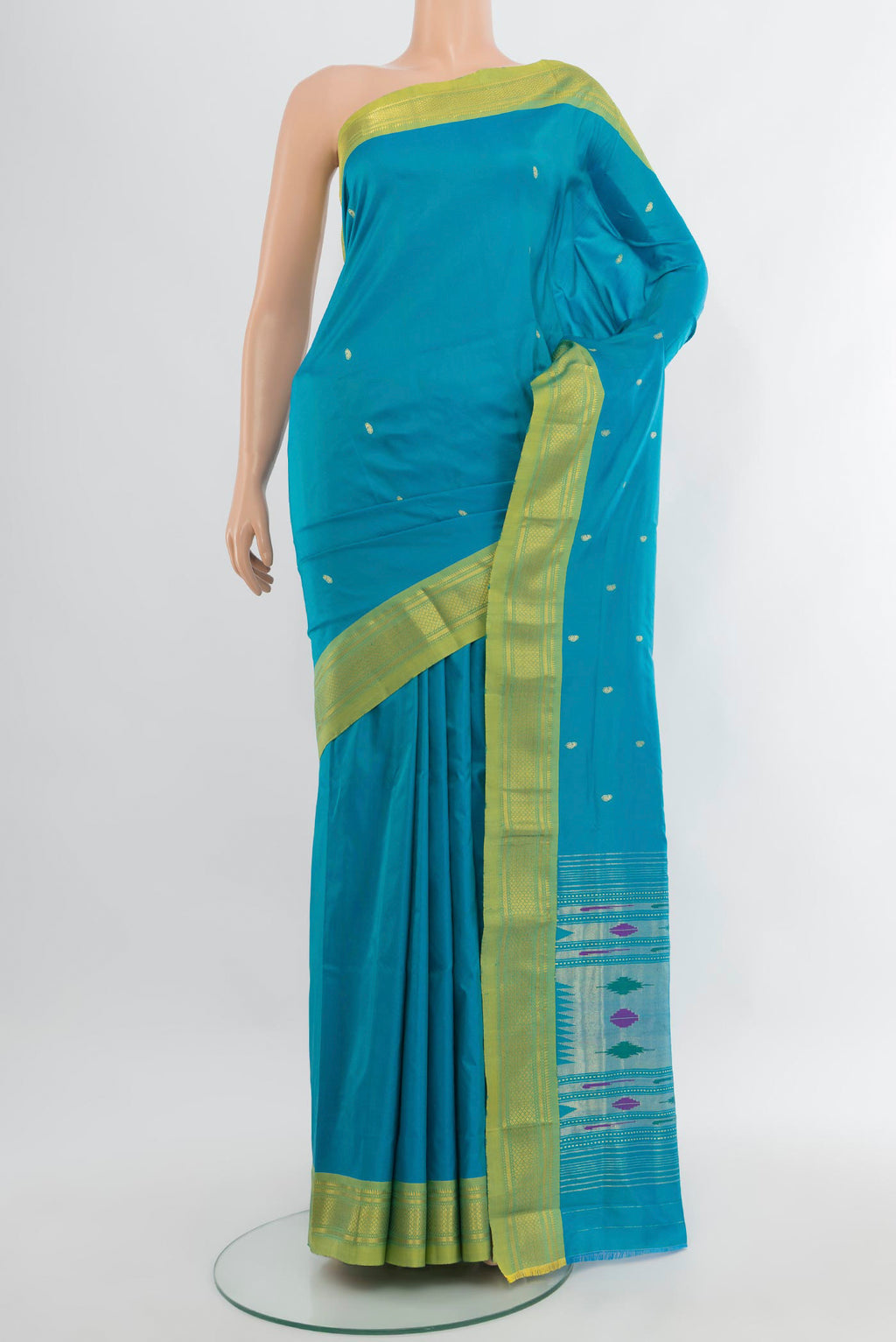 Blue Paithani Silk Saree with Zari Butta on the body and Zari Border.  displayed on a mannequin