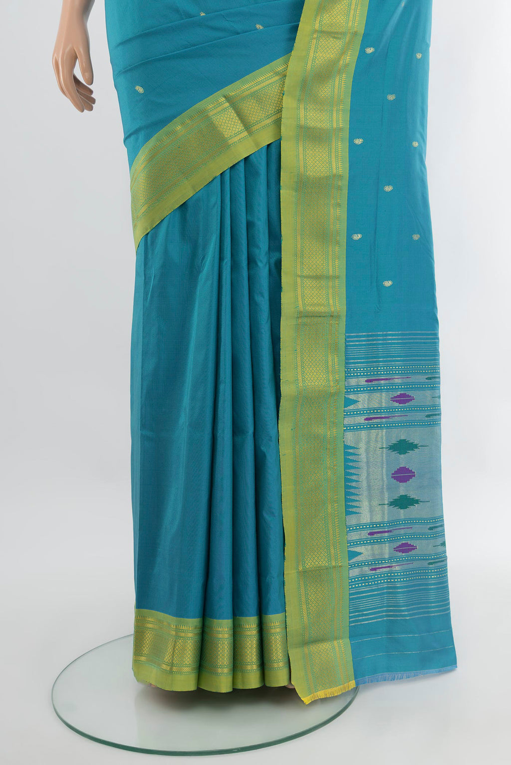 Pleats and pallu of Blue Paithani Silk Saree with Zari Butta on the body and Zari Border. 