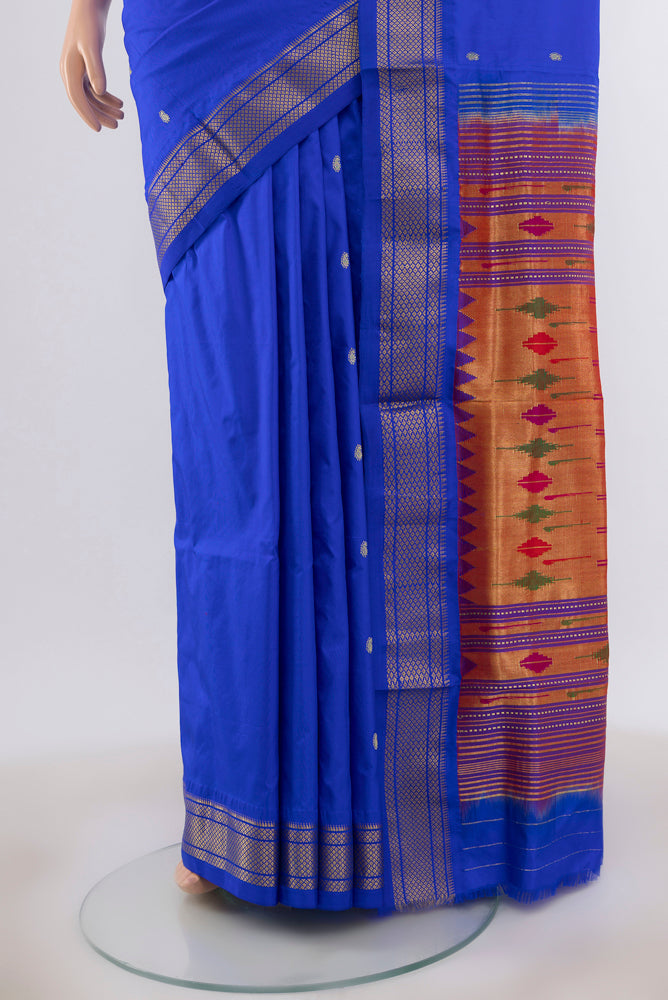 Pleats and pallu of Dark Blue Paithani Silk Saree with Zari Butta on the body and Silk Border. 