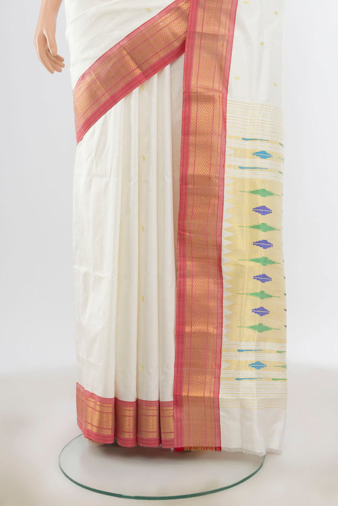 Pleats and pallu of Cream Paithani Silk Saree with Zari Butta on the body and Silk Border. 