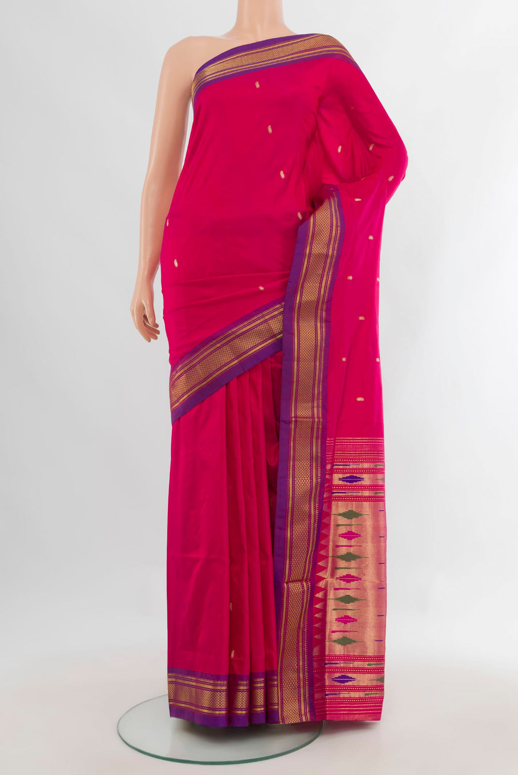 Pure Silk Rani Pink Paithani Saree with Zari Butta on the body and Zari Border.  displayed on a mannequin