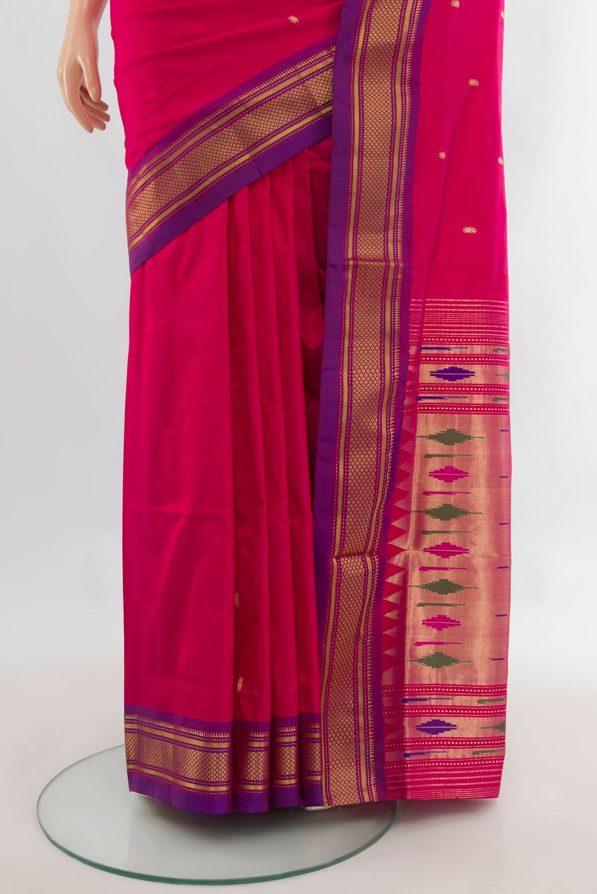 Pleats and pallu of Pure Silk Rani Pink Paithani Saree with Zari Butta on the body and Zari Border. 