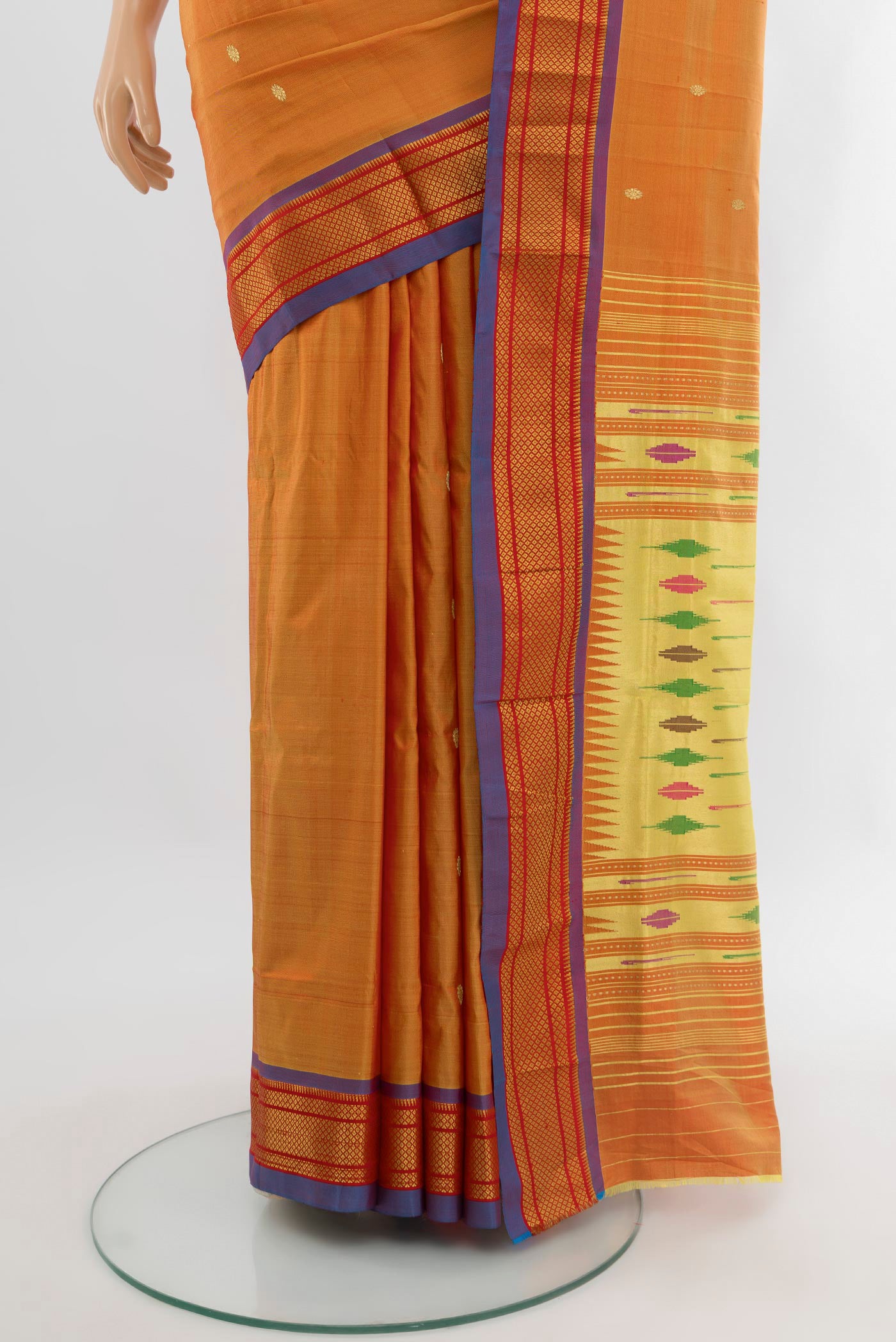 Pleats and pallu of Mustard Paithani Silk Saree with Zari Butta on the body and Zari Border. 
