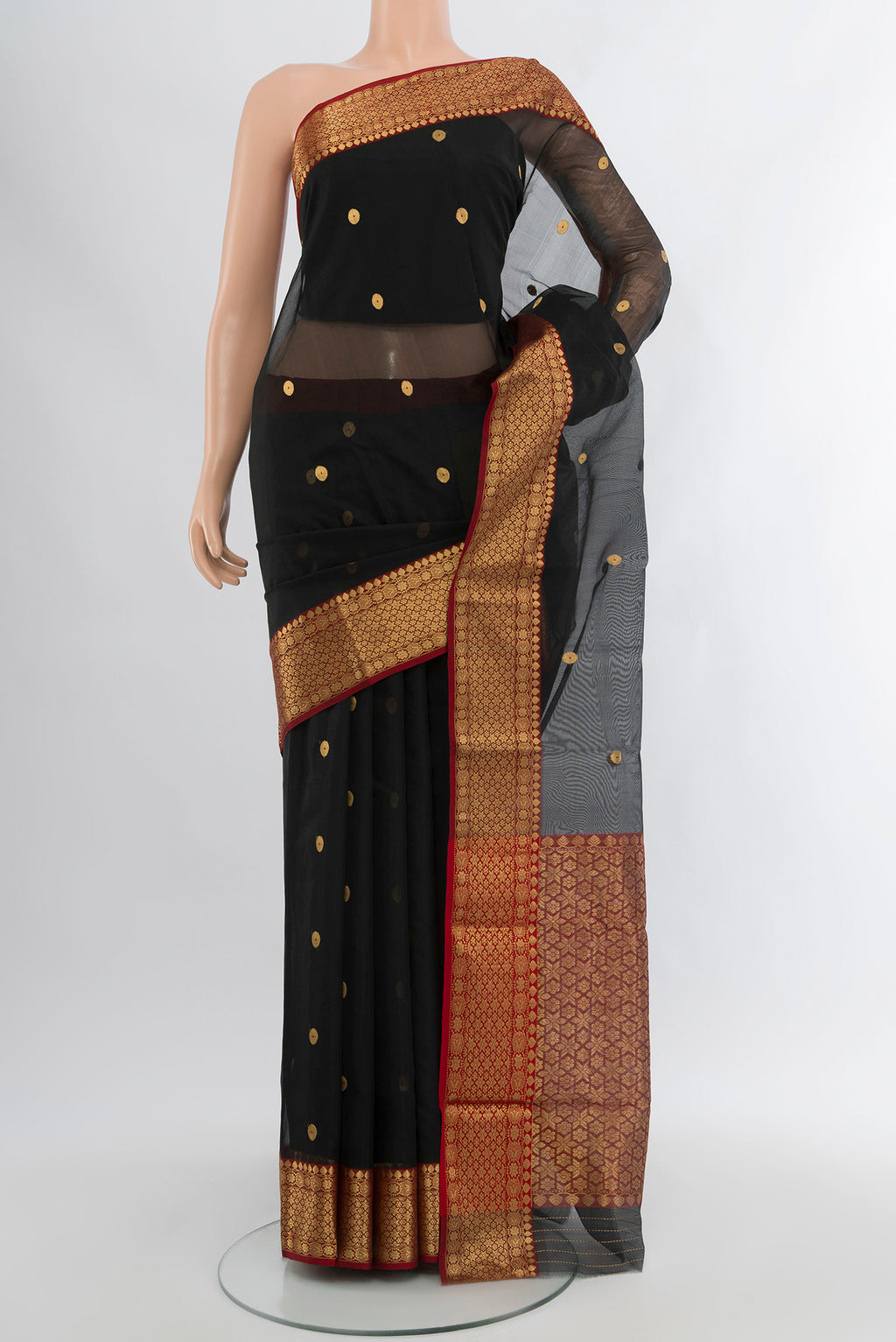 Black Chanderi Silk Cotton Saree with Zari Butta on the body and Zari Border.  displayed on a mannequin