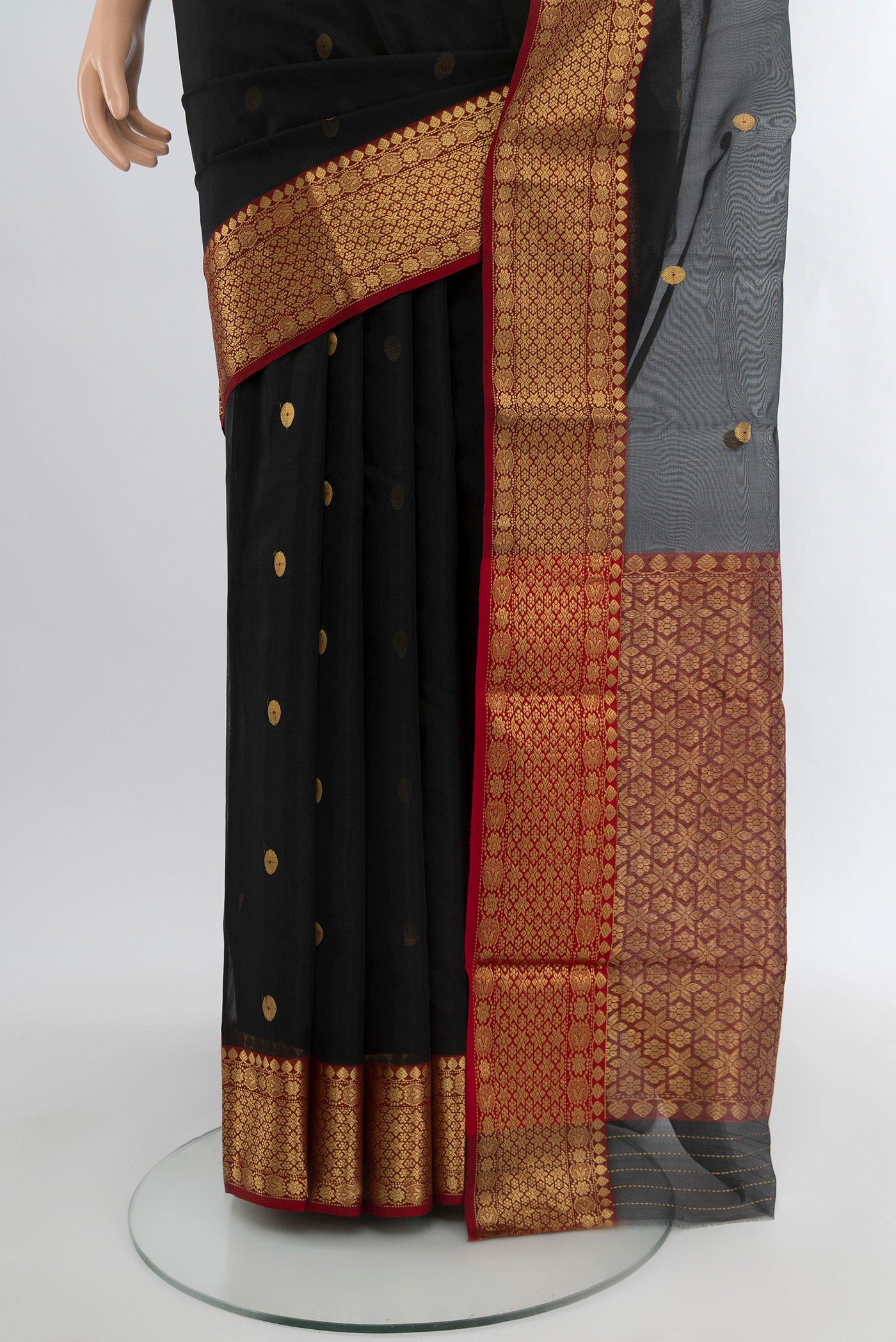 Pleats and pallu of Black Chanderi Silk Cotton Saree with Zari Butta on the body and Zari Border. 