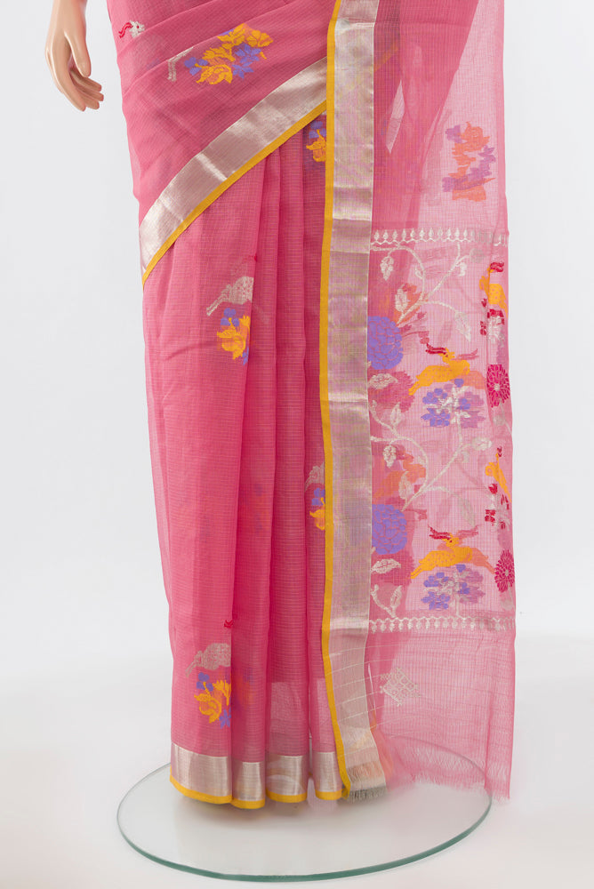 Pleats and pallu of Pure Silk Pure Zari Peach Kota Saree with Zari Butta on the body and Silk Border. 