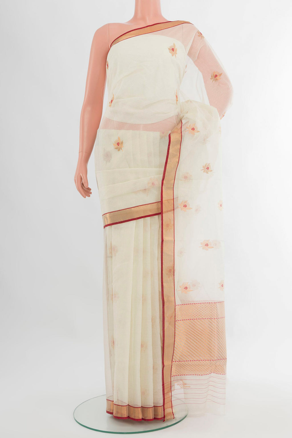 White Kota Silk Saree with Zari Butta on the body and Zari Border.  displayed on a mannequin