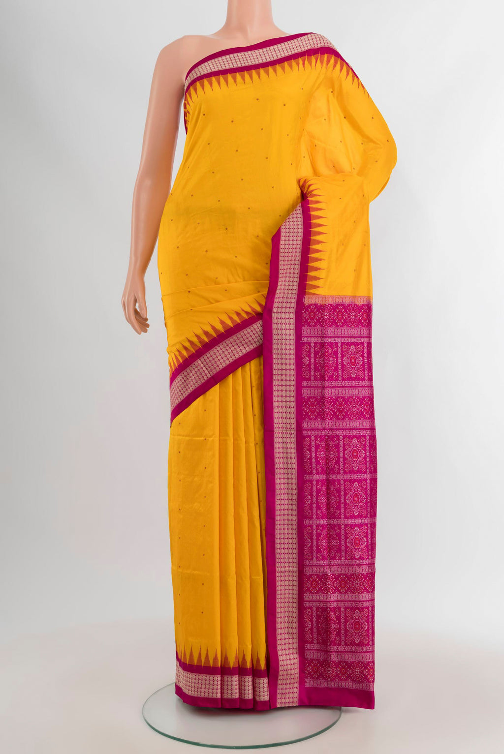 Yellow Orissa Silk Saree with Thread Butta on the body and Thread Border.  displayed on a mannequin