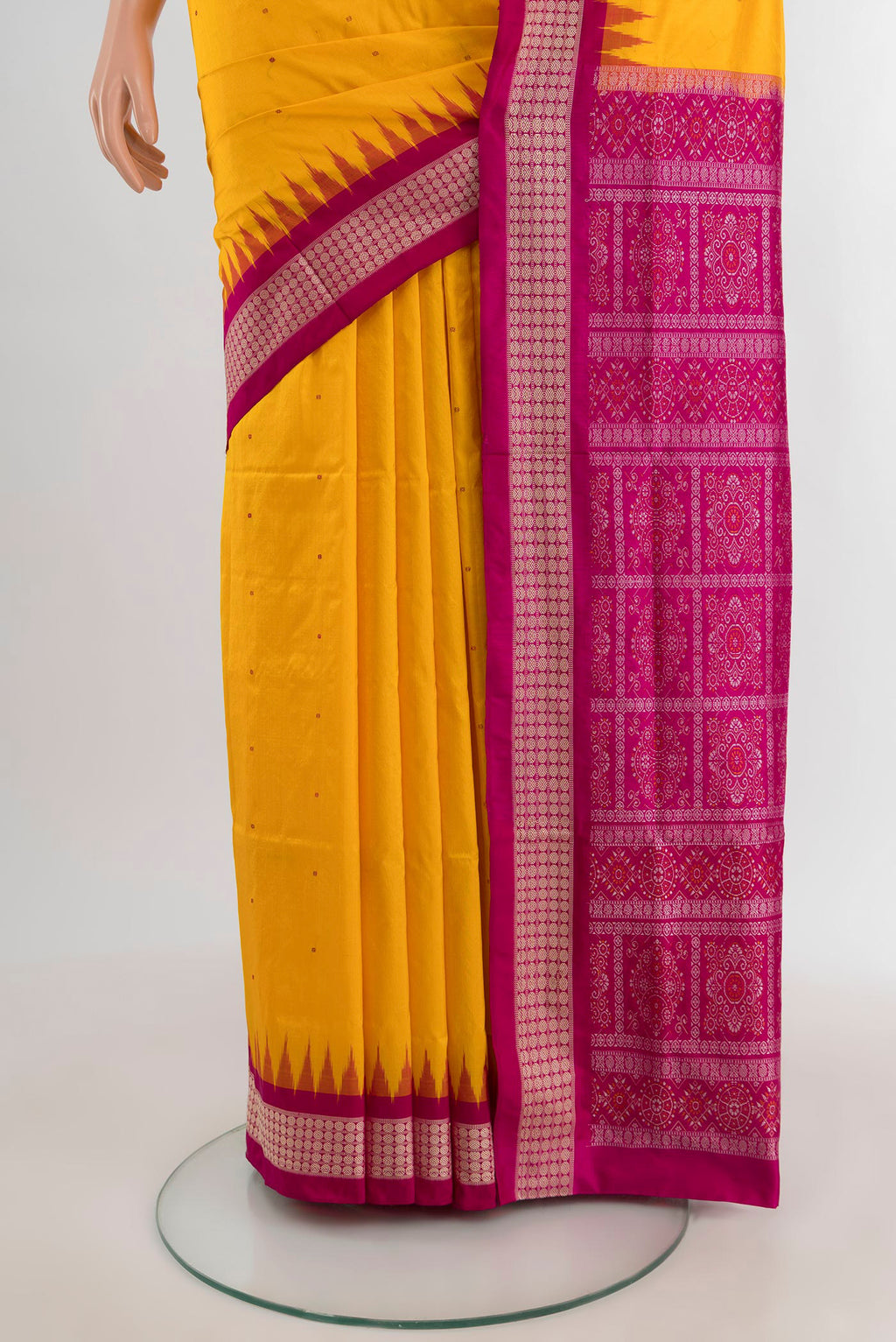 Pleats and pallu of Yellow Orissa Silk Saree with Thread Butta on the body and Thread Border. 