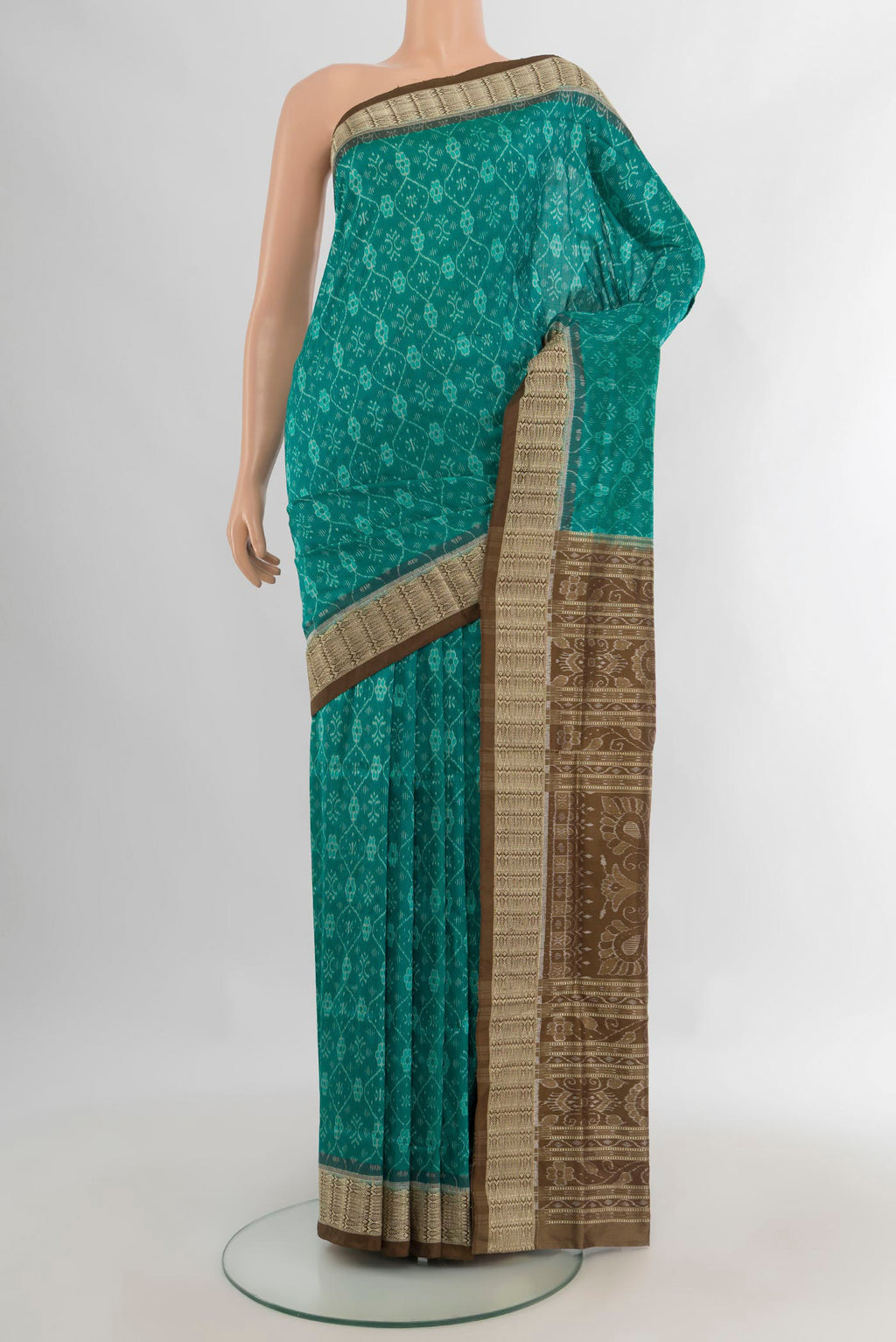 Pure Silk Turquoise Orissa Saree with Pure Ikat on the body and Thread Border.  displayed on a mannequin