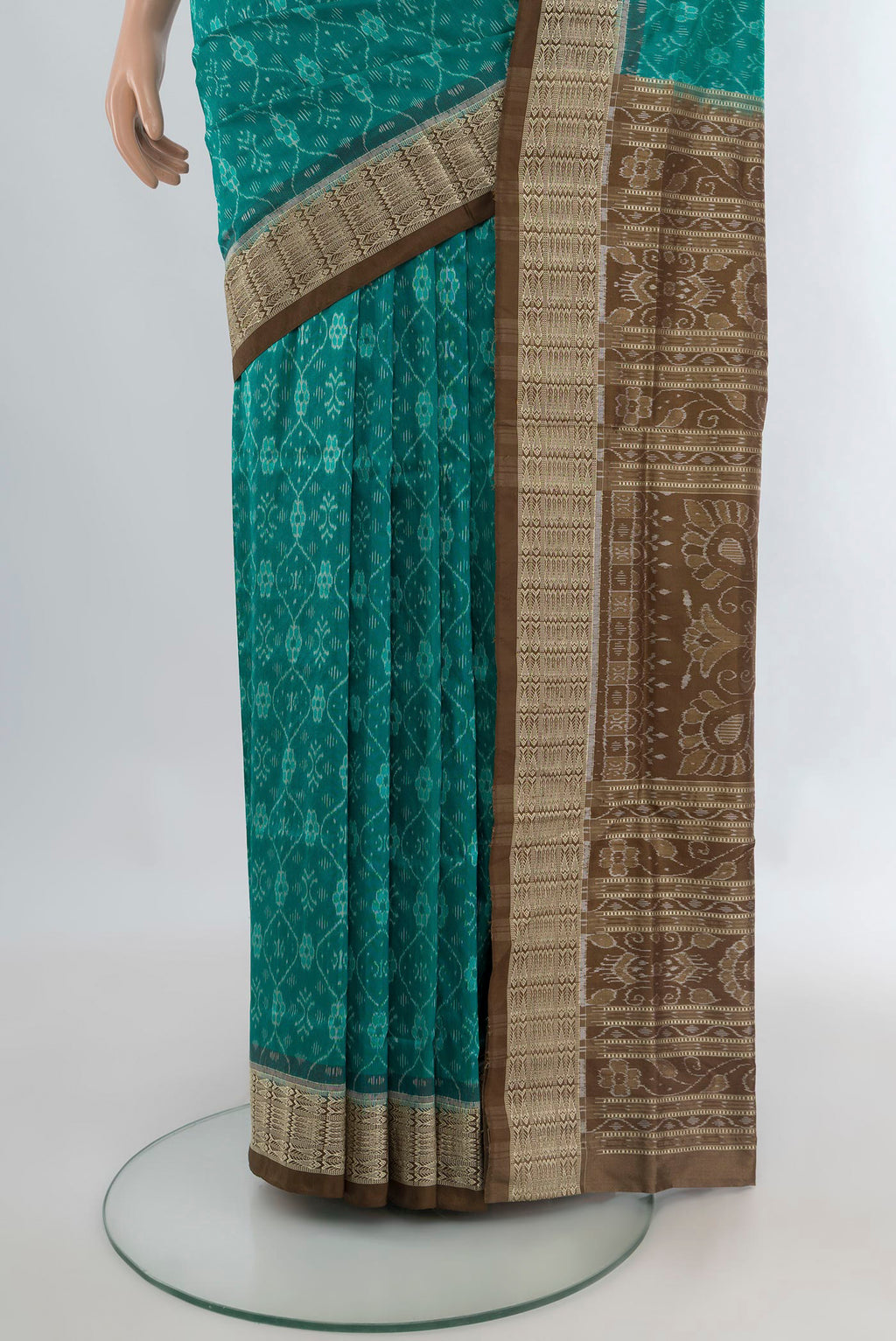 Pleats and pallu of Pure Silk Turquoise Orissa Saree with Pure Ikat on the body and Thread Border. 