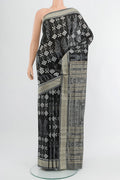 Black Orissa Silk Saree with Pure Ikat on the body and Thread Border.  displayed on a mannequin