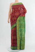 Maroon Orissa Silk Saree with Pure Ikat on the body and Zari Border.  displayed on a mannequin