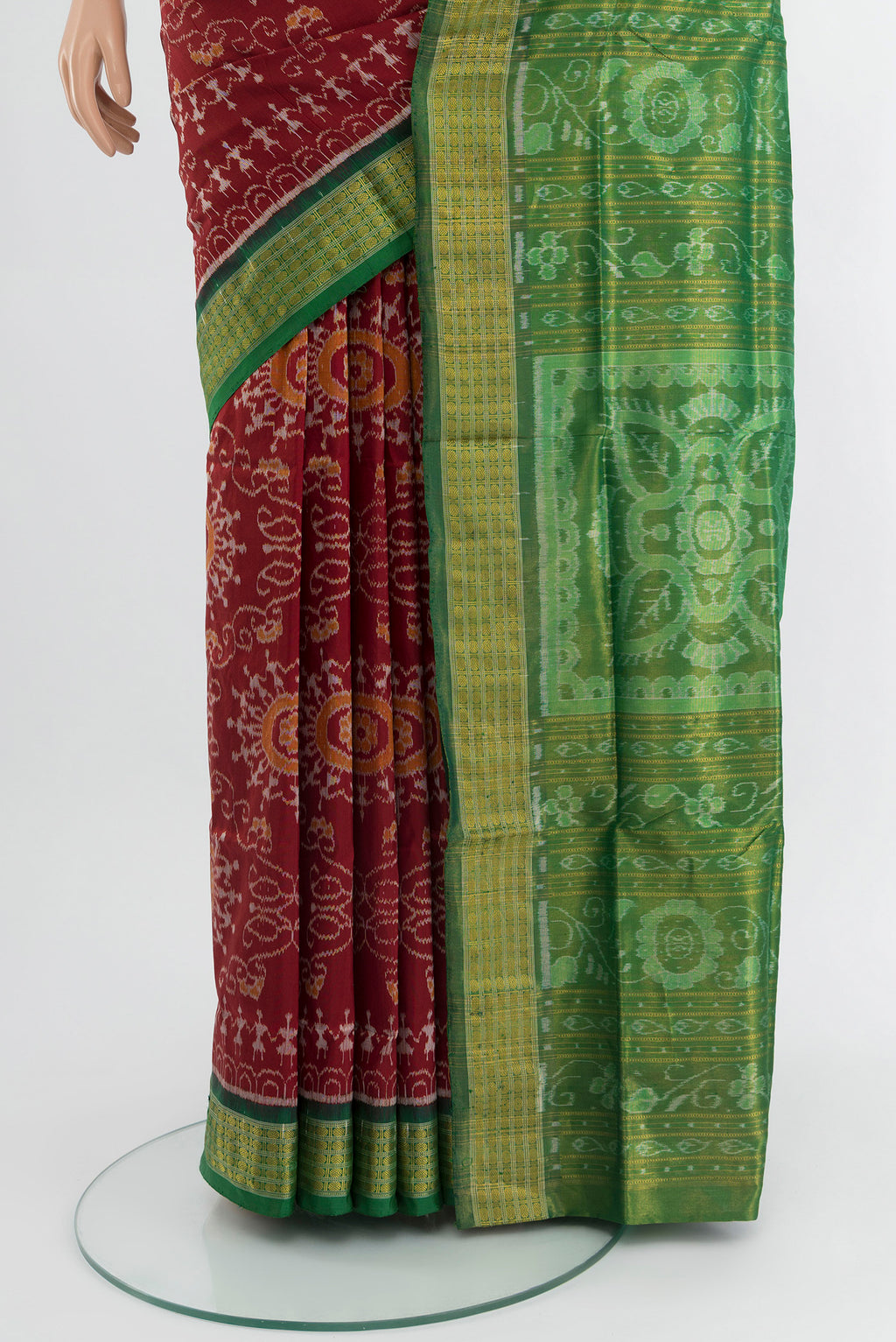Pleats and pallu of Maroon Orissa Silk Saree with Pure Ikat on the body and Zari Border. 