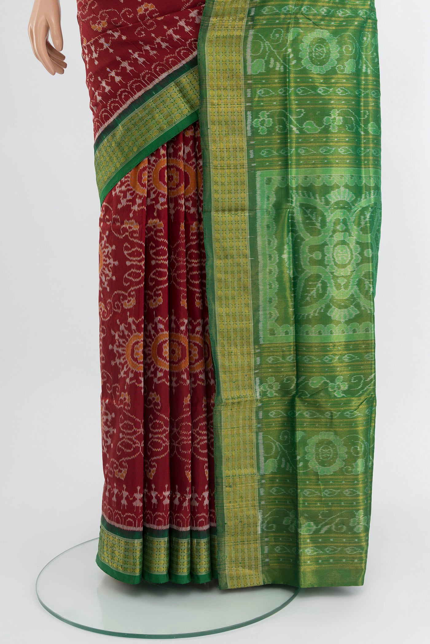 Pleats and pallu of Maroon Orissa Silk Saree with Pure Ikat on the body and Zari Border. 