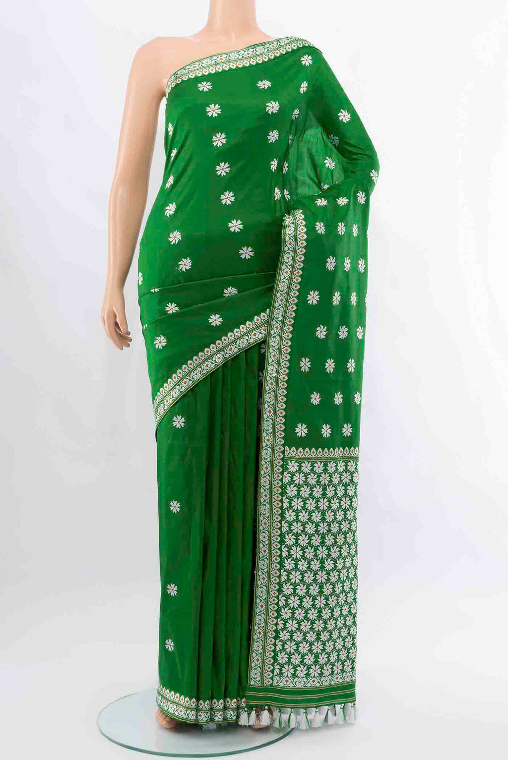 Bottle Green Assam Silk Saree with Thread Butta on the body and Silk Border displayed on a mannequin