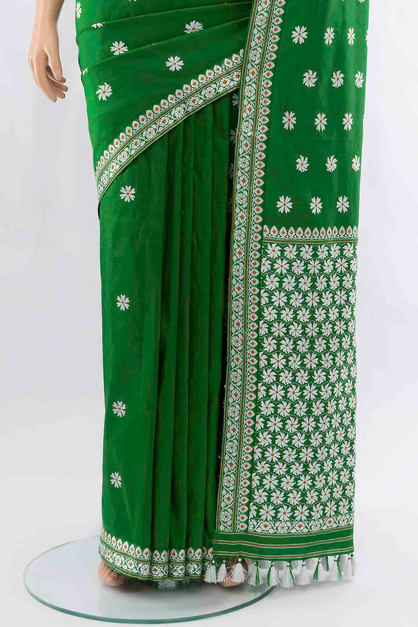 Pleats and pallu of Bottle Green Assam Silk Saree with Thread Butta on the body and Silk Border