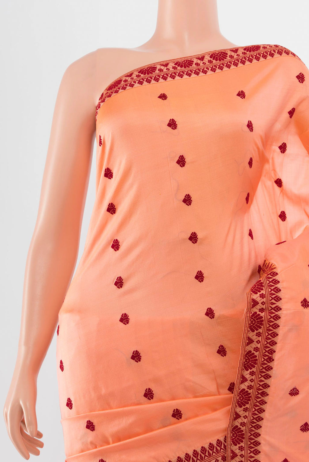 Border image of Orange Assam Silk Saree with Jacquard With Thread Butta on the body and Silk Border. 