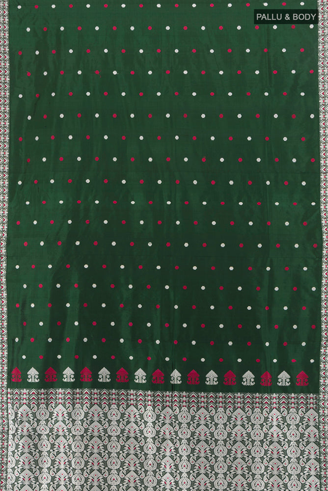 Flat view of Bottle Green Assam Silk Saree with Jacquard With Thread Butta on the body and Silk Border. 