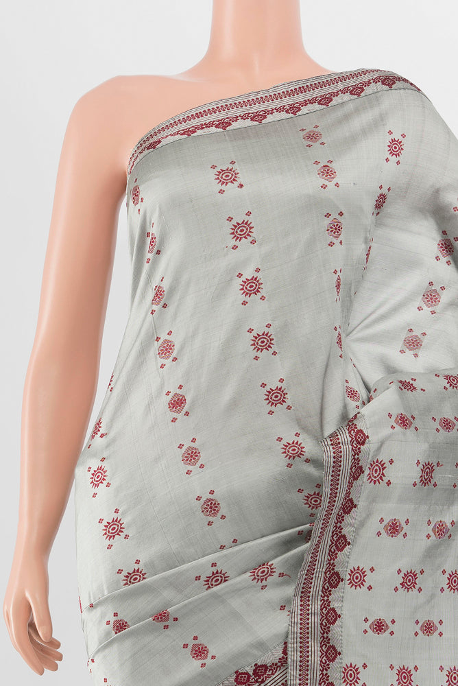 Border image of Grey Assam Silk Saree with Zari Butta on the body and Silk Border. 