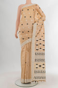 Pure Silk Beige Assam Saree with Thread Butta on the body and Thread Border.  displayed on a mannequin