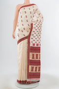 Cream Assam Silk Saree with Jacquard With Thread Butta on the body and Silk Border.  displayed on a mannequin