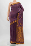 Bronze Assam Silk Saree with Thread Butta on the body and Silk Border displayed on a mannequin